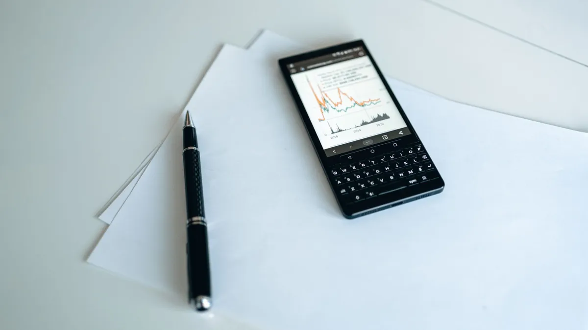 A smartphone displaying a food tracking app with colorful graphs and meal suggestions