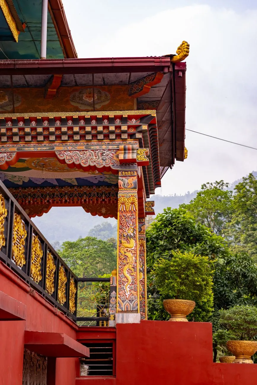 Bhutanese dzong fortress architecture against mountain backdrop