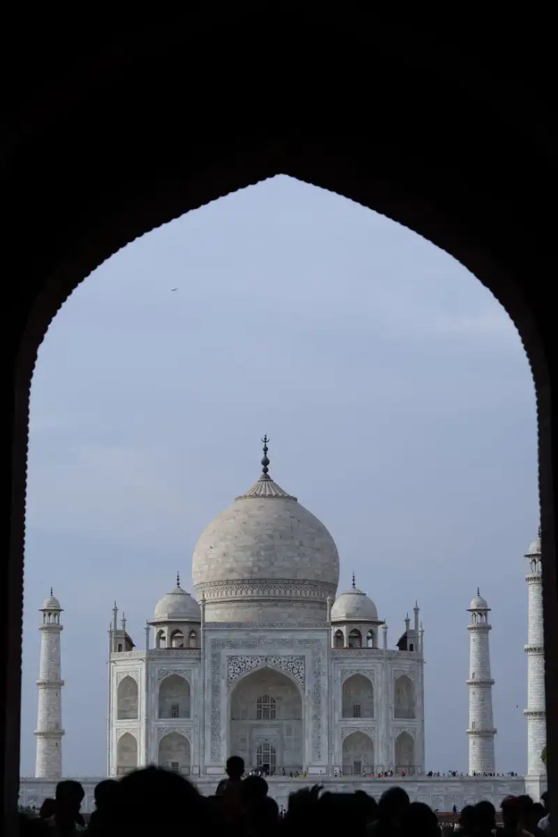 A bird's eye view of the entire Taj Mahal complex with its symmetrical gardens and surrounding structures