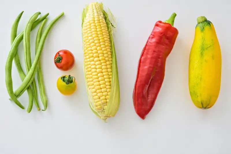 Fresh raw vegetables on a wooden board