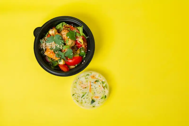 Fresh salad in a ceramic bowl