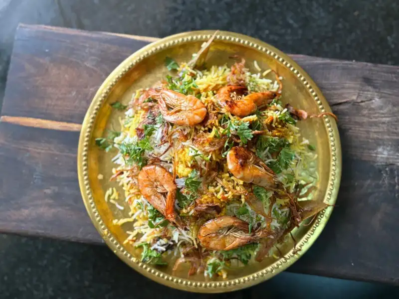 A royal Mughal feast with biryani as the centerpiece