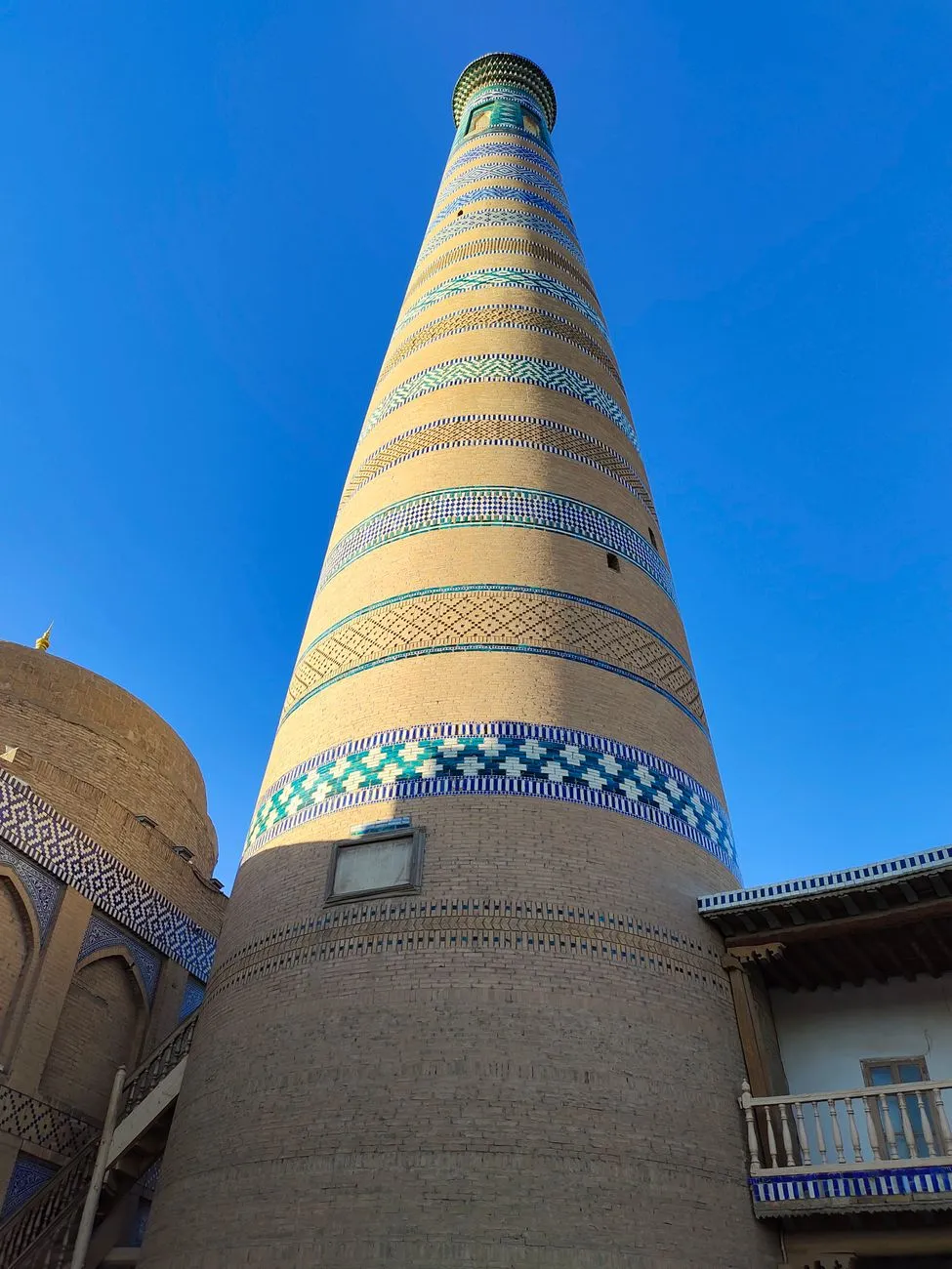 Khiva's turquoise minarets at sunrise