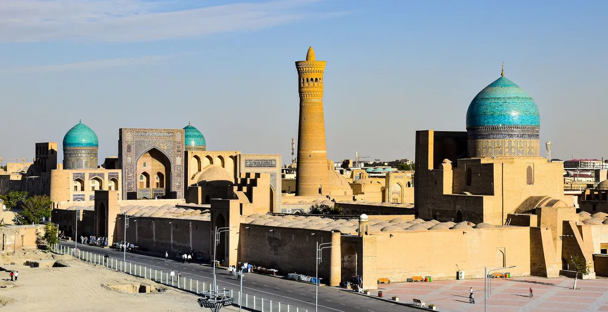 Kalyan Minaret and Mosque against a blue sky