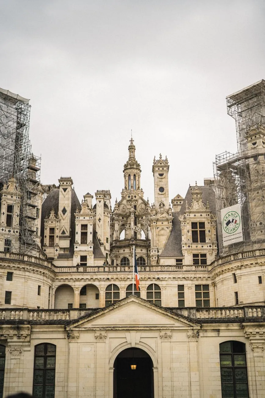 The grand spires of Château de Chambord reaching towards the blue sky