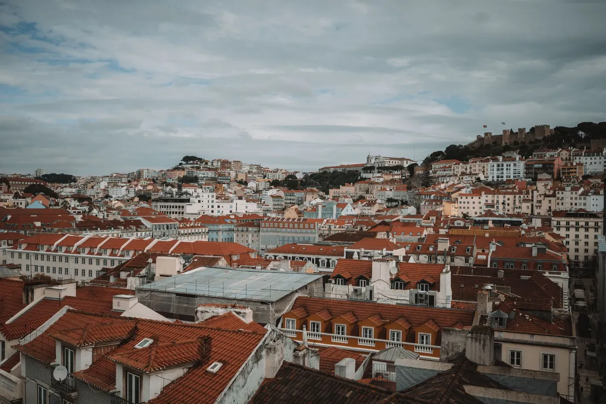 Digital nomad working from a rooftop in Lisbon