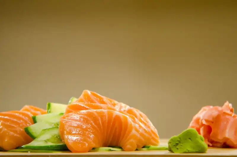 Fresh raw salmon fillets on a cutting board