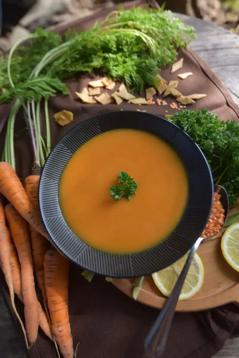 A bowl of steaming hot lentil soup