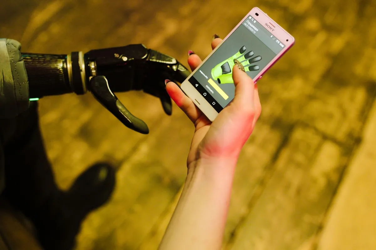 A human hand interacting with digital interface data