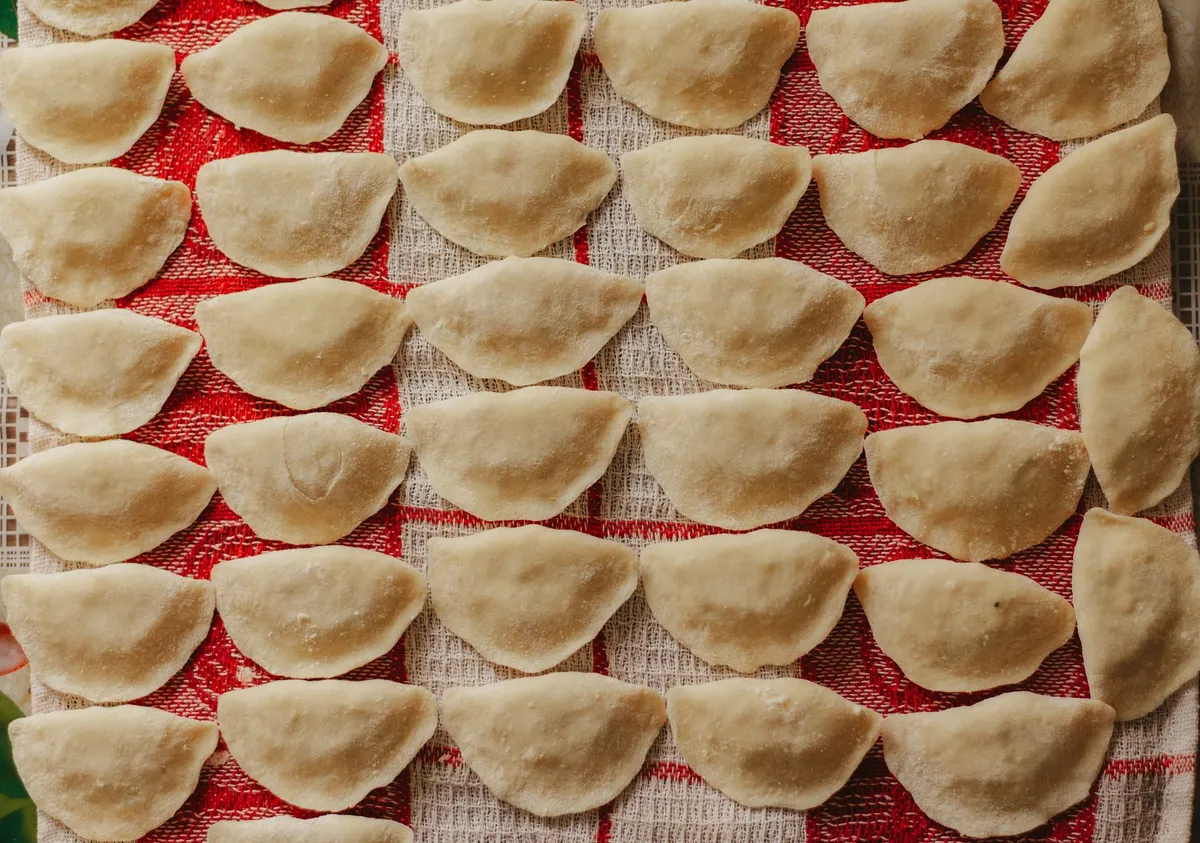 Traditional Polish pierogi being cooked