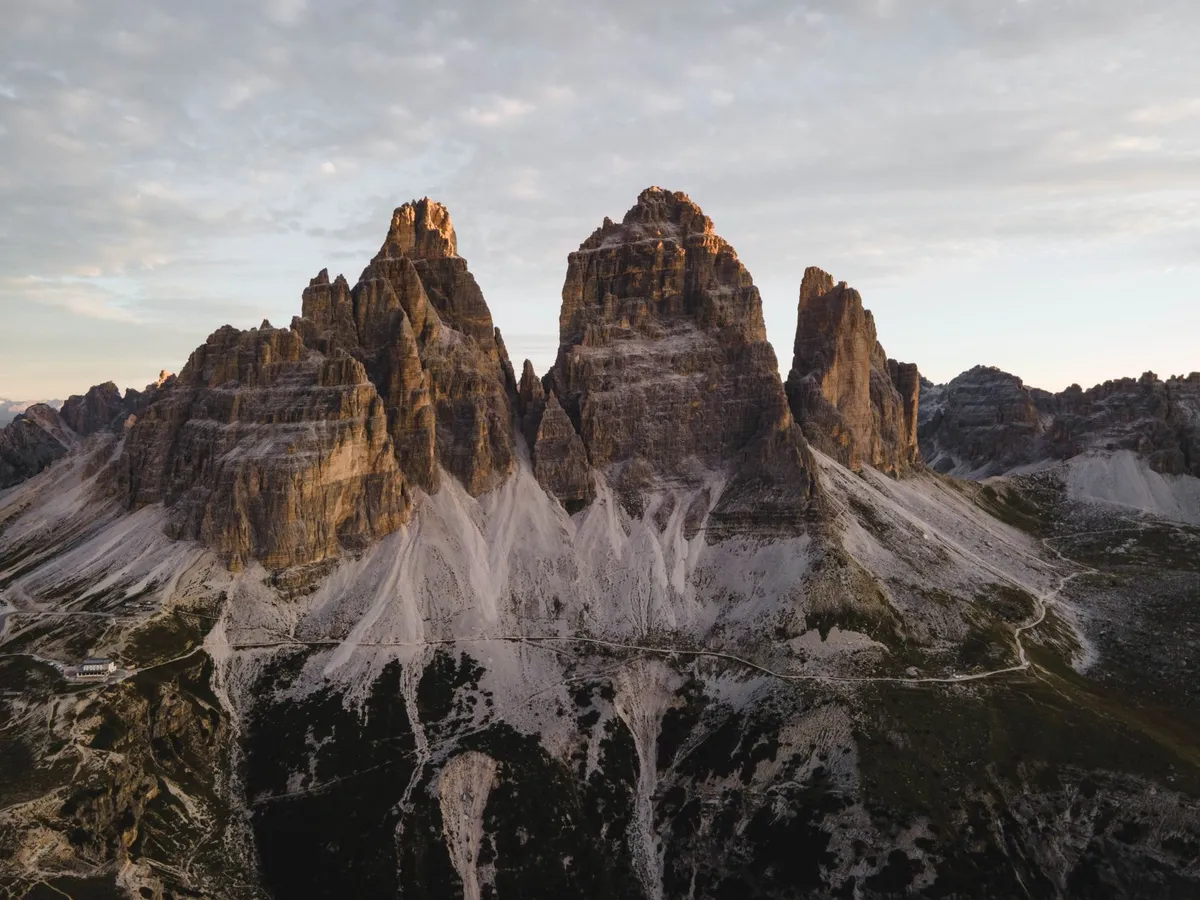 The dramatic spires of the Tre Cime di Lavaredo at sunset