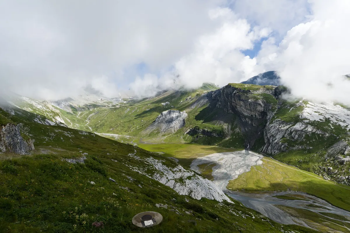 Panoramic view of the Dolomite valleys, demonstrating the need for ecological mindfulness