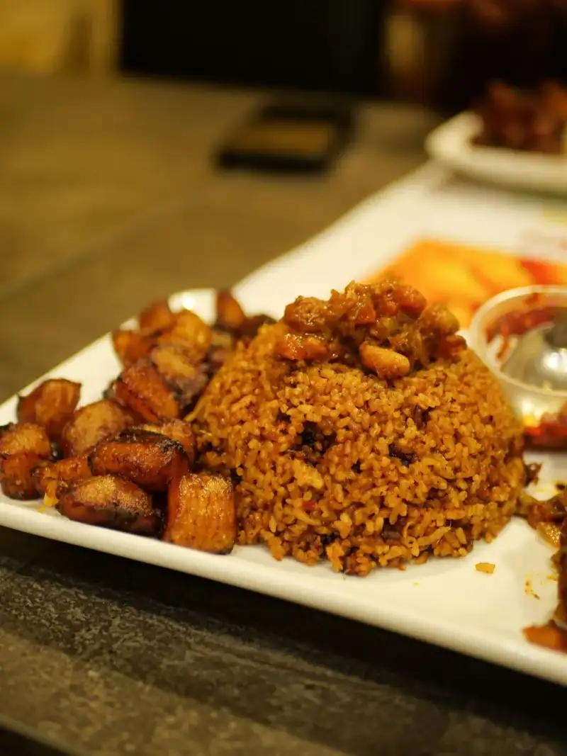 Waakye being cooked in a large pot