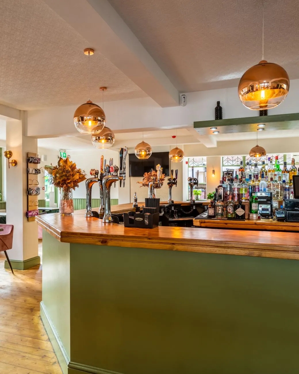 Grimy pub interior with patrons