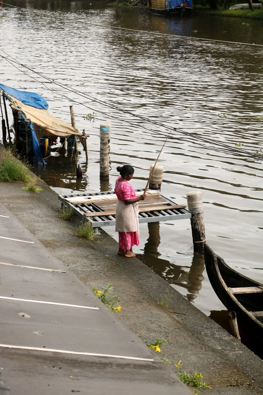 Kerala backwaters agricultural landscape with houseboat