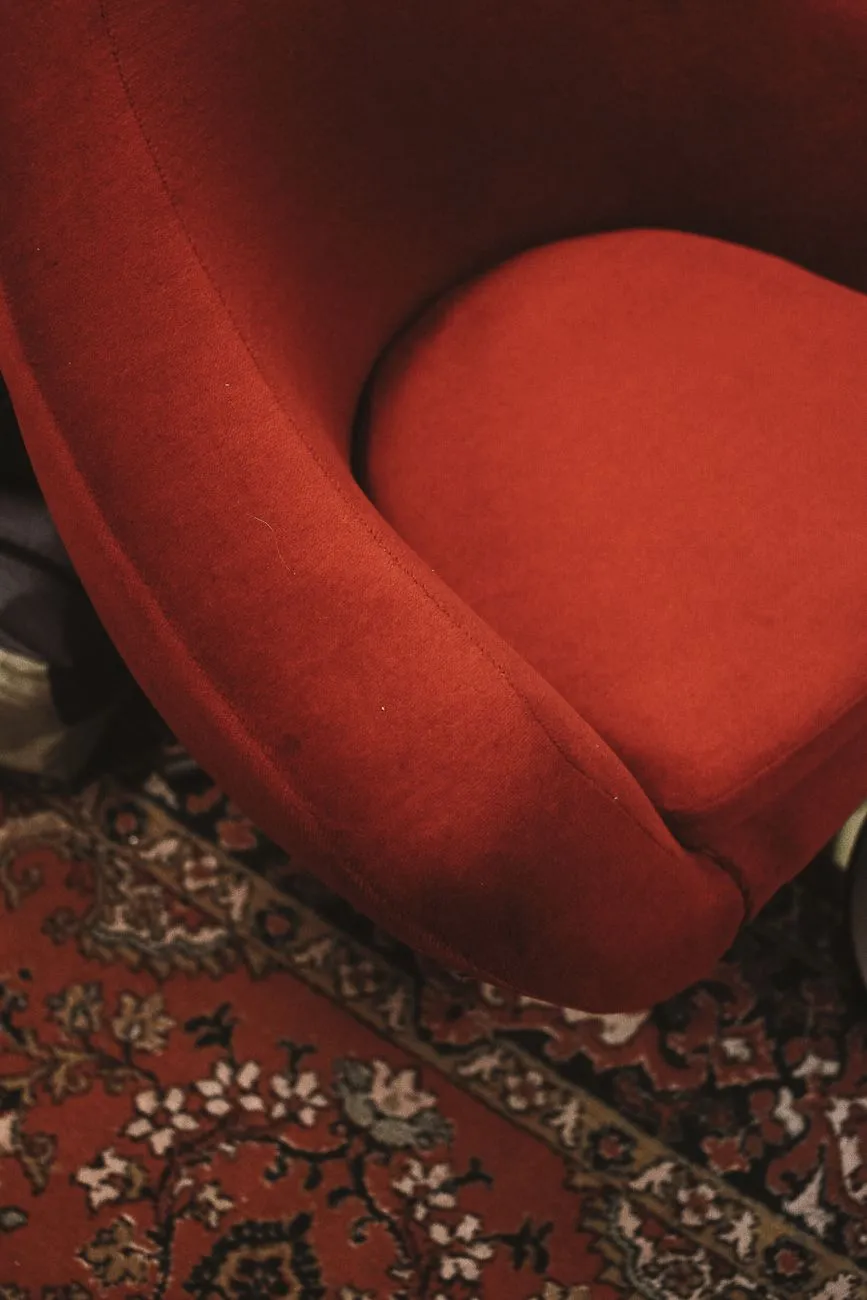 Luxurious vintage train carriage interior with velvet seats and warm lighting