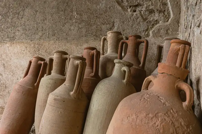 Antique wine amphora with relief decorations
